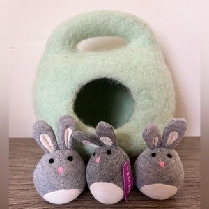 Bunnies in a felt burrow